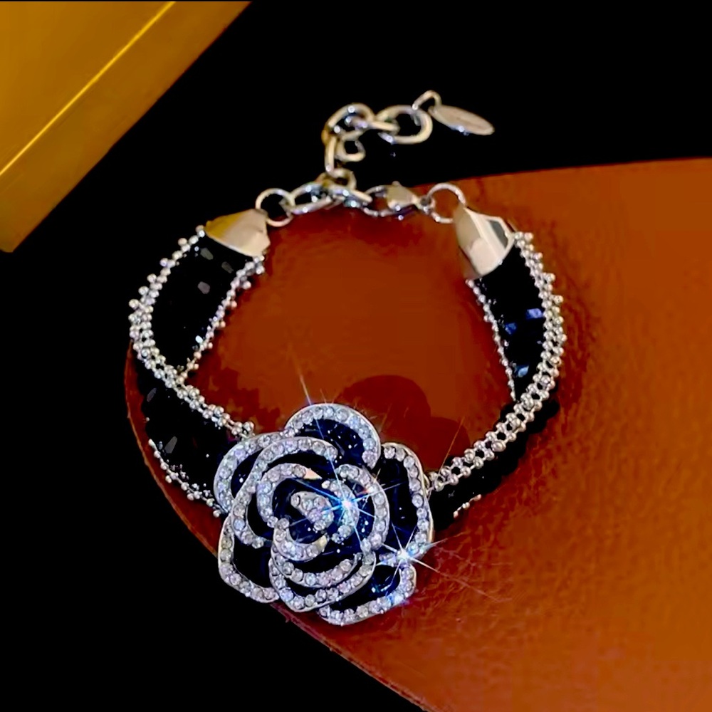 Very black and silver plated flower bag.